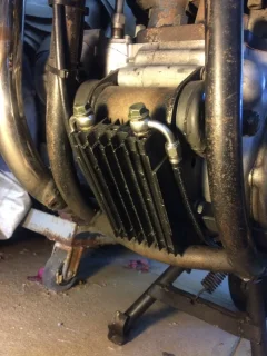 Oil cooler MOUNTING locations/designs on Commandos, let’s see ‘em
