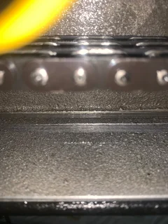 Commando primary chain rubbing on bottom of inner chain case Alton Electric Starter Kit. Commando primary chain rubbing on bottom of inner chain case Alton Electric Starter Kit.