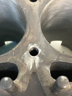 Damaged center bolt hole on cylinder barrel
