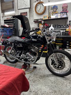 Interstate kit with Corbin seat and I state side covers. The tank is metal black with painted silver logos cleared over