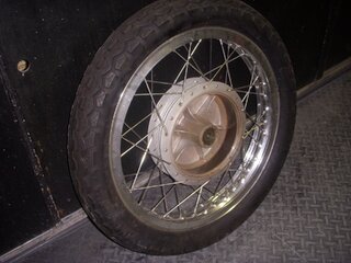 NORTON COMMANDO DRUM FRONT WHEEL ALLOY RIM MINT TIRE AND SS SPOKES 19