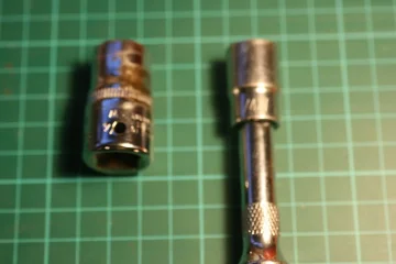 3 head bolts/nuts front n' center