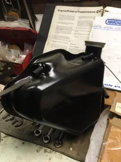 Extra tube on oil tank Extra tube on oil tank