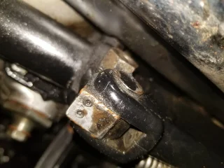 Dominator Sidestand and Chainguard question