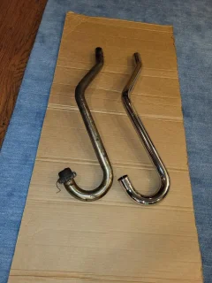 Newly made P11 high level exhaust pipes. Newly made P11 high level exhaust pipes.