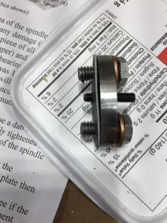 One piece rocker spindle plate fitment