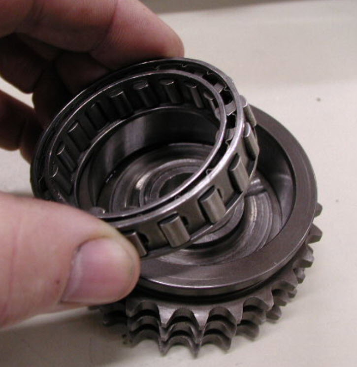 OldBritts-Installing%20E-start-starter-gear-train-setting-up-backfire-assembly.jpg