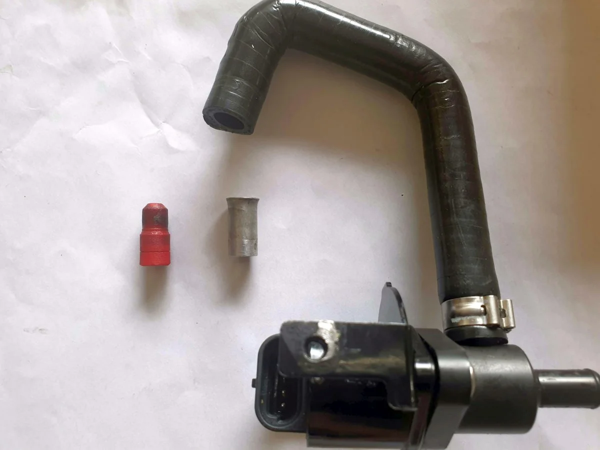 IAC assembly with plug